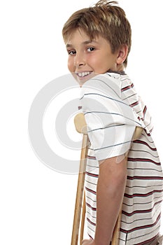 Child using crutches photo