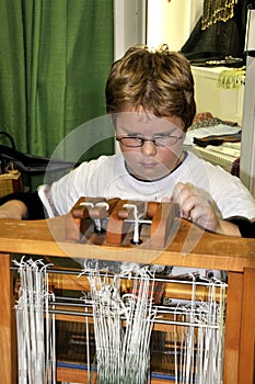 Child Using Loom