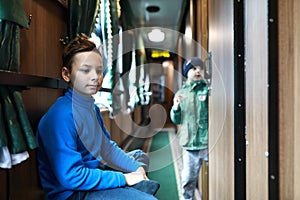 Child in vintage train carriage