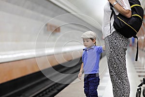 Child waiting train
