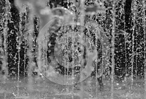 Child walking in water fontain