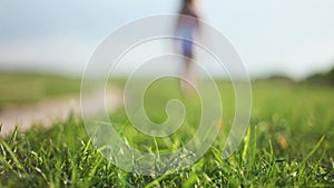 A child walks on the grass