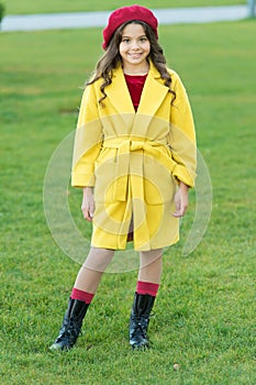 Child in warm clothes. Feeling cozy and comfortable. Fancy coat. Classic coat does not have to be boring but sticking to