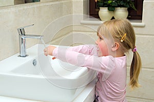 Child washing hands