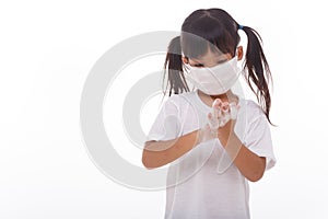 Child washing hands and showing soapy palms.