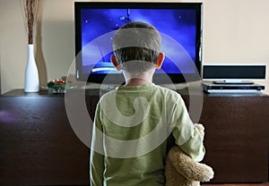 Child watching TV photo