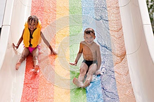 Child on water slide