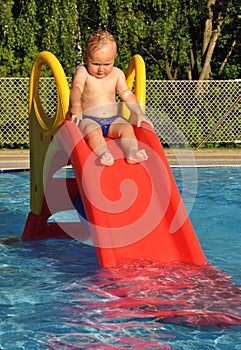 Child on water slide