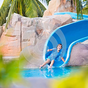 Child on water slide