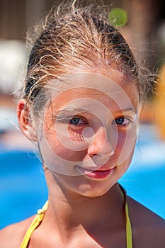 Child on water slide in aquapark.