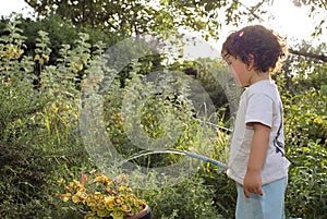 Child watering garden