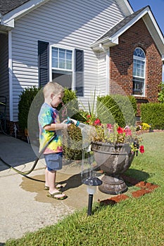 Child watering plants