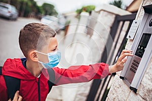 Child wear facemask during coronavirus and flu outbreak. photo