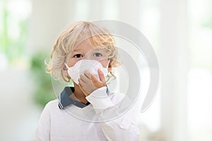 Child wearing face mask. Virus outbreak