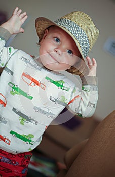 Child wearing a fedora hat photo