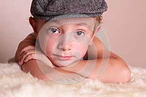 Child wearing Flat Cap