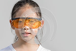 Child Wearing Futuristic Smart Glasses Device Displaying Digital Information in Augmented Reality Concept