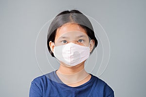 Child Wearing Hygienic Mask photo