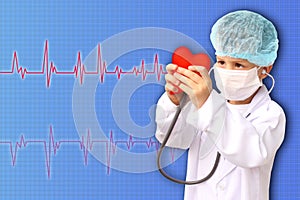 Child in a white doctorâ€™s coat, hat and mask attached a stethoscope to a red heart model, research background, close-up, face