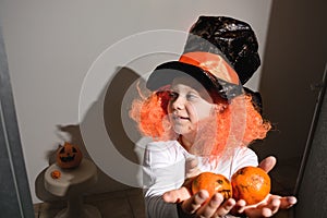 Child in wig for Halloween