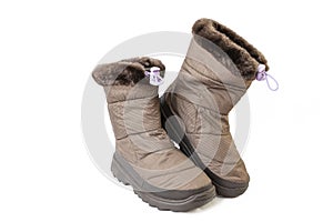 child winter boots, brown colored, isolated on white