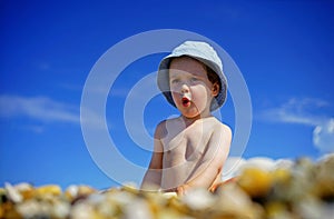 Child wonder concept, cute child at the beach