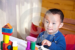 Child and wooden blocks