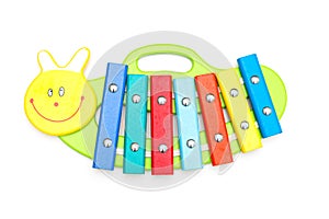 Child wooden xylophone on a white background. Education concept