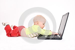 The child works on a computer