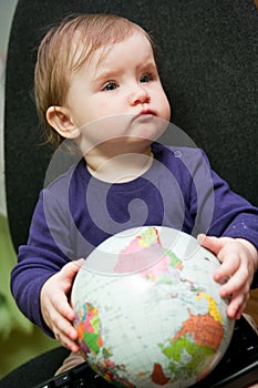 Child with world globe