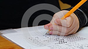 The child writes with his left hand test