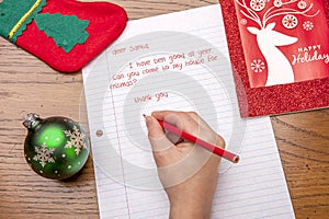 Child writing to Santa.