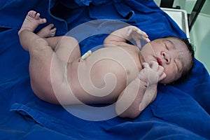 Childbirth baby asian girl after born