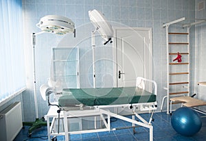 Childbirth hospital room with gymnastics wall bars. Delivery room