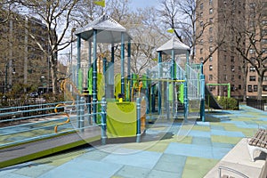 Childern`s colorful climbing playground in urban city setting