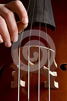 Childhand is playing the cello