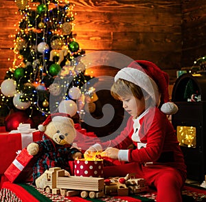 Childhood activity and game. Christmas attributes. Family holiday. Childhood memories. Santa boy celebrate christmas at