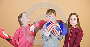 Childhood activity. Sport success. Team fight. workout of small girls and boy boxer in sportswear. Happy children in