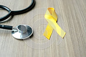 Childhood Cancer Awareness, Yellow Ribbon with stethoscope for supporting people living