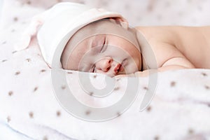 Childhood, care, motherhood, health, medicine, pediatrics concepts - Close up Little peace calm infant newborn