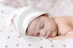 Childhood, care, motherhood, health, medicine, pediatrics concepts - Close up Little peace calm infant newborn baby girl in