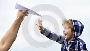 Childhood. Child son playing with paper airplane. Carefree. Freedom to Dream - Joyful Boy Playing With Paper Airplane