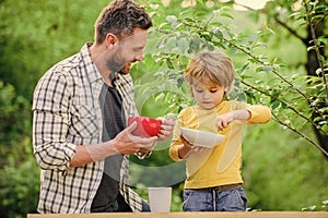 Childhood happiness. Baby food. happy fathers day. Little boy with dad have breakfast. healthy food and dieting. Dairy