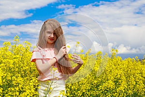 Childhood happiness concept. Teenager outdoors. Girl in nature, lifestyle