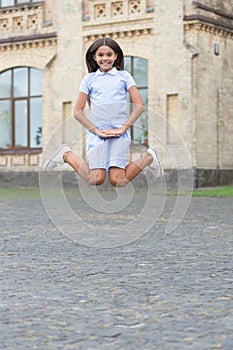 childhood happiness of happy teen girl outdoor. childhood happiness of teen girl jumping