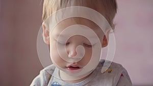 Childhood, leisure, game, self-isolation, technology, communication concept - close up cute two-year-old blond-haired