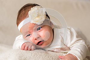 Childhood, motherhood, emotions, fashion concepts - Cute smiling happy chubby baby close up little girl in beautiful