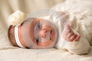 Childhood, motherhood, emotions, fashion concepts - Cute smiling happy chubby baby close up little girl in beautiful