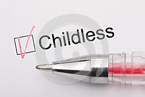 Childless - checkbox with a cross on white paper with pen. Checklist concept