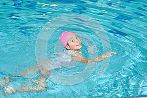 Children activities on nice swimming pool